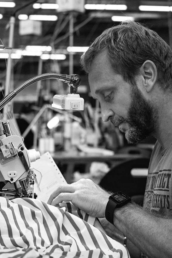 <i>The seamstresses'</i> golden fingers